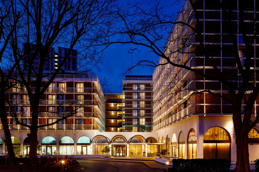 London Marriott Hotel Regents Park lit up at dusk, a hotel event venue between Regent's Park and Primrose Hill