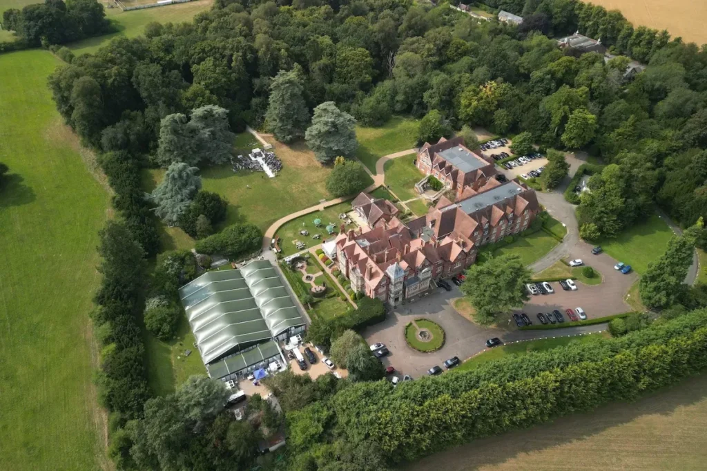 Aerial view of Pendley Manor, a country house hotel and wedding venue in the Hertfordshire countryside